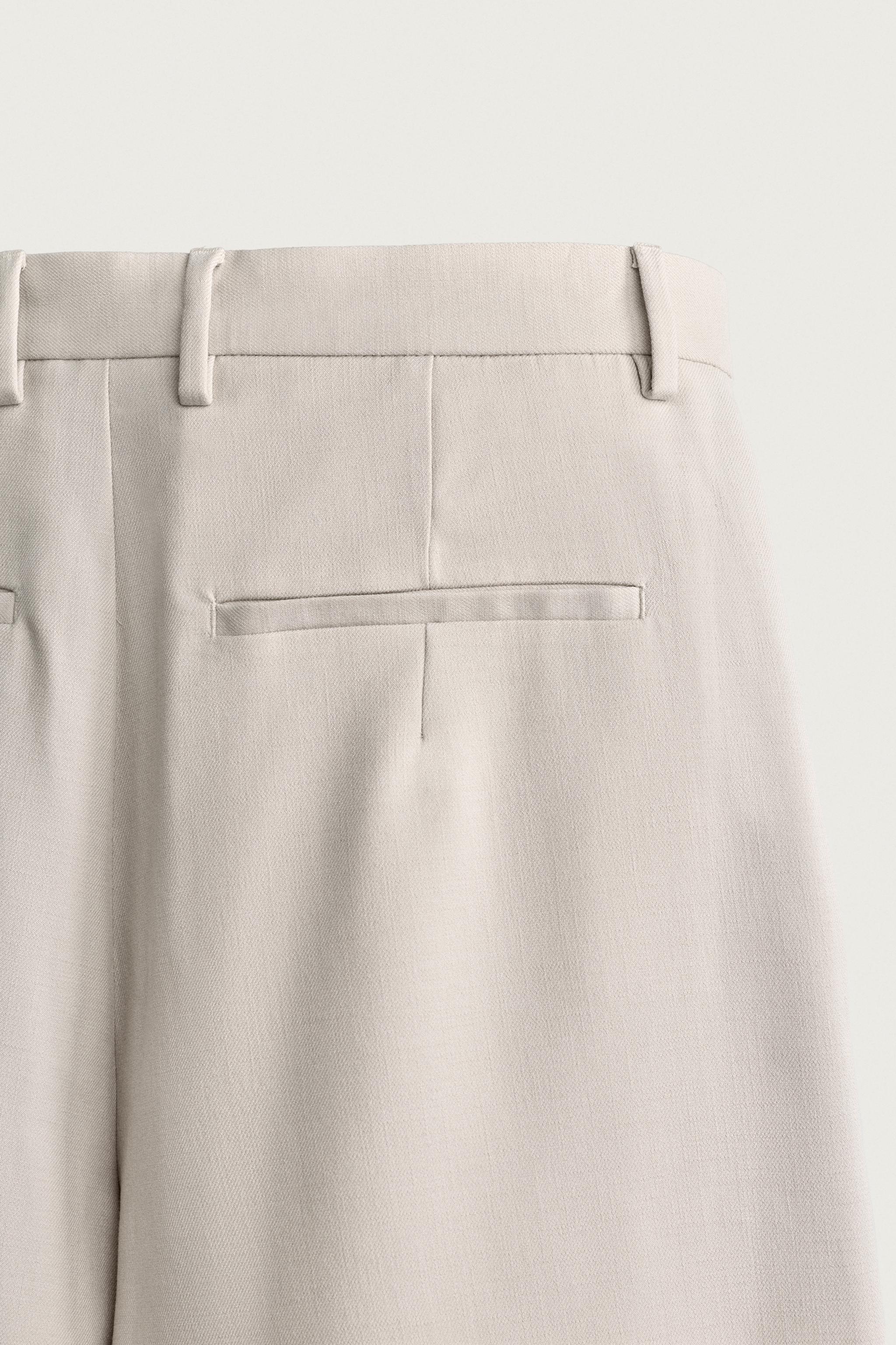 WIDE FIT PLEATED SHORTS